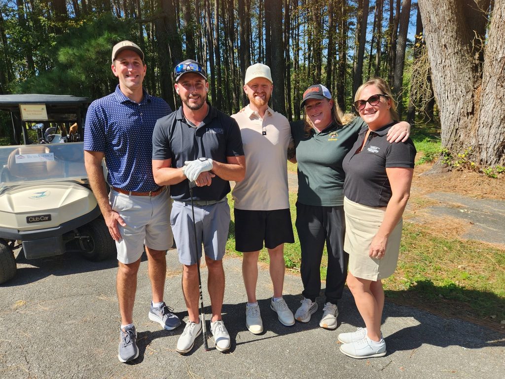 Ross Evans with golfers at the Salisbury Area Chamber of Commerce Golf Classic at Green Hill Country Club.