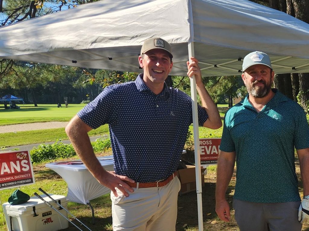 Ross Evans at his Ball Sponsor tent with his District 7 campaign signs at the Salisbury Area Chamber of Commerce Golf Classic.