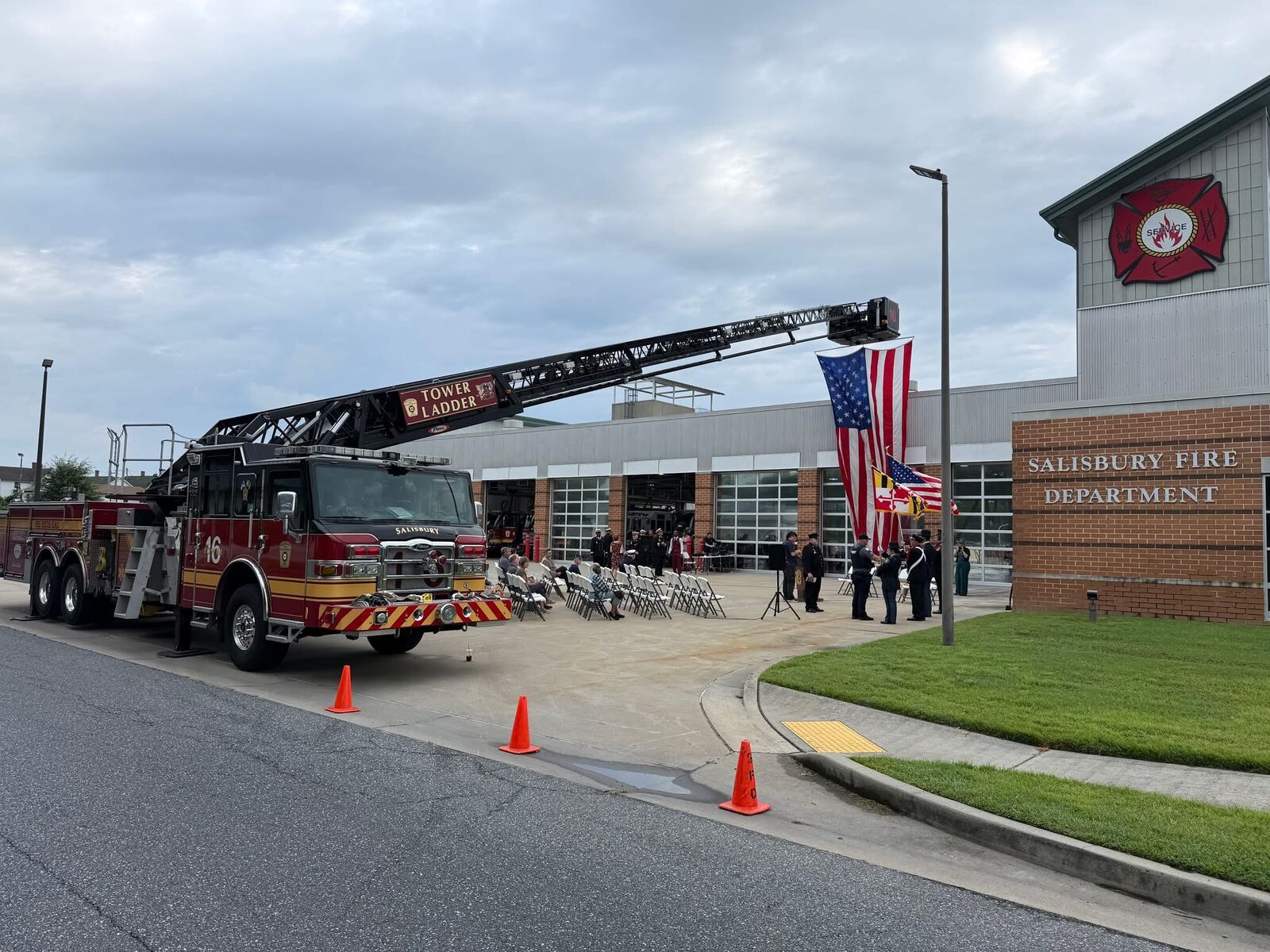 Salisbury Fire Department Station 16 during the 9/11 Memorial Ceremony, ladder truck raised with American flag