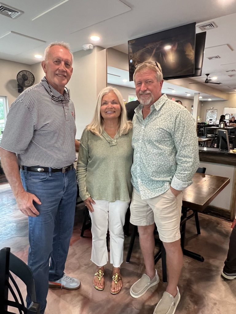Three guests at the Taylor's BBQ meet and greet.