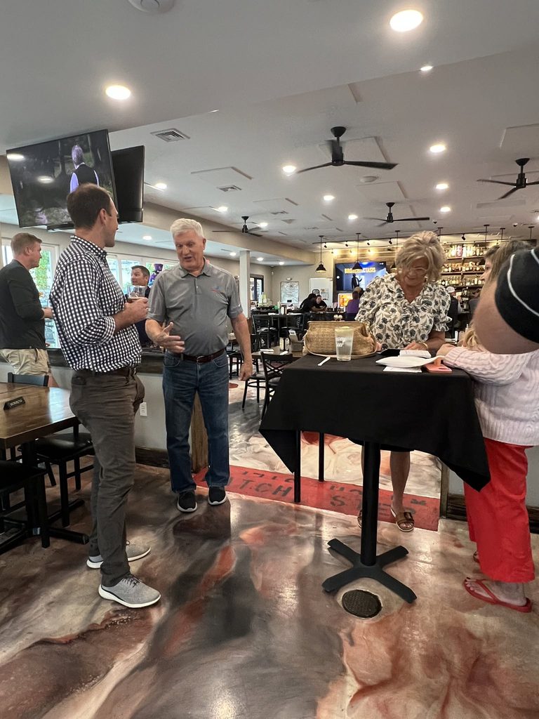 Ross Evans and guests in the dining room at Taylor's BBQ.